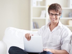 A young man with laptop