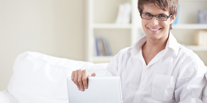 A young man with laptop